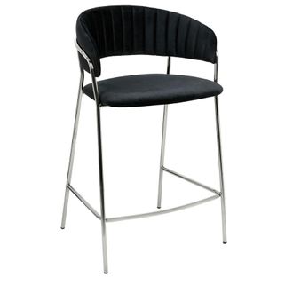Hoker MARGO 65 - czarny/chrom   Siedzisko i oparcie hokera Margo są tapicerowane miękkim i przyjemnym w dotyku welurem. Mocna i stabilna konstrukcja wykonana...
