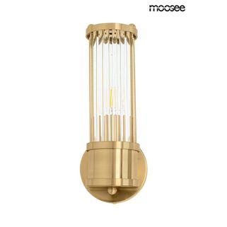 Lampa ścienna PILAR złota.Elegancka osłona kloszy wykonana została ze stali w kolorze złotym. Wewnątrz oprawy zamocowane są delikatne kryształowe...