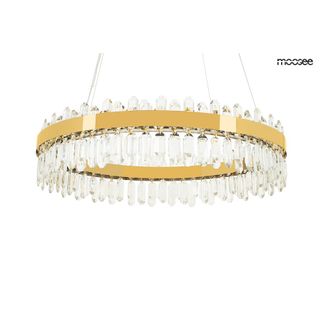 Ekskluzywna i elegancka oprawa, która udekoruje nowoczesne wnętrza w stylu Glamour. Stalowa obręcz w złotym kolorze z dodatkiem błyszczących kryształów...