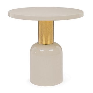 Nowoczesny stolik NALIMA, spodoba się osobom lubiącym elegancję. Jego prosta, wykonana z metalu i emaliowana podstawa daje mu solidne oparcie. Blat stolika...