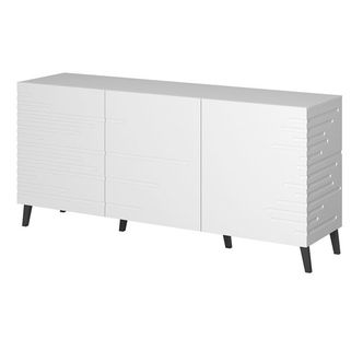 Komoda 3-drzwiowa IKON - biały mat Komoda Ikon w białym kolorze to mebel stworzony do nowoczesnych i minimalistycznych wnętrz, które potrzebują...