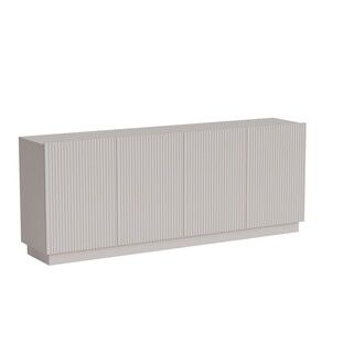 Komoda 4-drzwiowa ARDEA - kaszmir mat Komoda Ardea to nie tylko mebel, ale architekt wnętrzarskiego spokoju. Dzięki rozciągniętej, eleganckiej formie i...