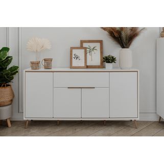 Komoda 4-drzwiowa ARONA - biały Komoda Arona w białej odsłonie z detalami w kolorze dąb artisan to harmonijne połączenie nowoczesnego designu i...
