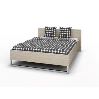Łóżko STYLE 140x200 - dąb sonoma Sypialnia to jedno z najbardziej intymnych pomieszczeń w naszym mieszkaniu. To miejsce, w którym jesteśmy sami ze sobą...