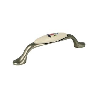 Uchwyt UP19 - nikiel patynowany, porcelana mleczna z kwiatem / rozstaw 96 mm   Wymiary: - długość całkowita: 128 mm - rozstaw otworów: 96 mm   Materiał:...