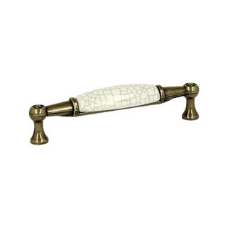 Uchwyt ROMANA 1699 - stary mosiądz, jasnobeżowa popękana porcelana / rozstaw 96 mm  Wymiary:- długość całkowita: 107 mm - rozstaw otworów: 96 mm...