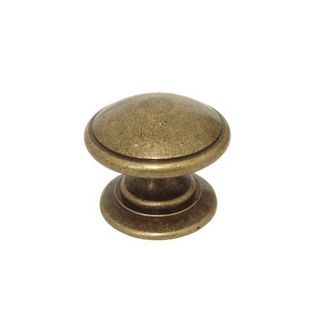 Gałka TAZIO 24466 - stary mosiądz / fi 30 mm    Wymiary: - średnica: 30 mm - wysokość całkowita: 26 mm   Materiał: metal    Kolor pokrycia: stary...