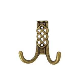 Wieszak 43144 - stary mosiądz / wys. 8,1 cm    Wieszak 43144 włoskiego producenta Bosetti-Marella wykonany został ze stopu cynku i aluminium, w pokryciu...