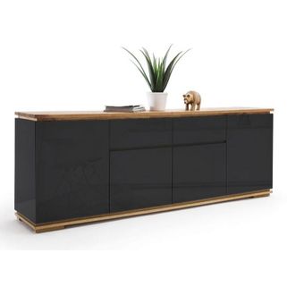 Wymiary: - szerokość 182 cm - głębokość 40 cm - wysokość 81 cm   Maksymalne obciążenie: 50 kg   Materiał: - lakier czarny połysk - blat i...