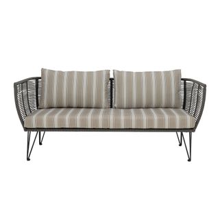 Sofa Mundo marki Bloomingville wykonana jest z malowanego proszkowo czarnego metalu z ciemnozieloną poliestrową liną wplecioną ręcznie w ramę. Poszewki na...