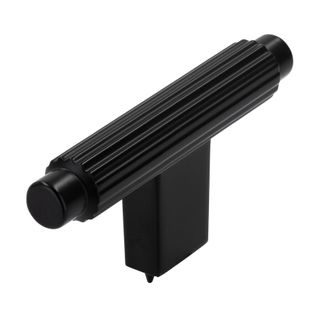 Gałka w kształcie litery T 2594 - czarny mat / 70 mm Wymiary: - szerokość: 70 mm - wysokość: 12 mm - głębokość: 32 mm Materiał: metal Kolor: czarny...