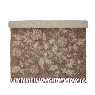 Dywan Malu marki Creative Collection jest wykonany z bawełny i ma piękny wzór kwiatów w naturalnym odcieniu, który wprowadza przytulną atmosferę do...