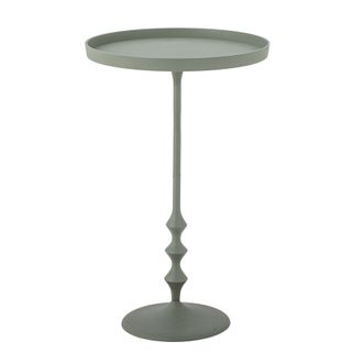 Stolik boczny Anjou marki Bloomingville ma lekki i elegancki design w zakurzonym zielonym kolorze. Stolik tworzy piękny kontrast z bardziej neutralnymi meblami...