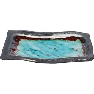 Półmisek z kamionki ARI - niebieski Wymiary: - szerokość: 22,1 cm - głębokość: 13,6 cm - wysokość: 3,1 cm Materiał: kamionka szkliwiona Informacje...