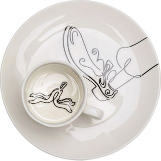 Filiżanka ze spodkiem FAVOLA BANANA 160 ml - biały Wymiary: - średnica: 19 cm - wysokość: 6,5 cm - pojemność: 160 ml Materiał: porcelana szkliwiona...