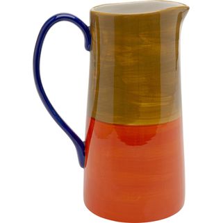 Karafka CAPRI - wielokolorowy Wymiary: - szerokość: 11 cm - głębokość: 16,5 - wysokość: 21,7 cm - pojemność: 1345 ml Materiał: kamionka Informacje...