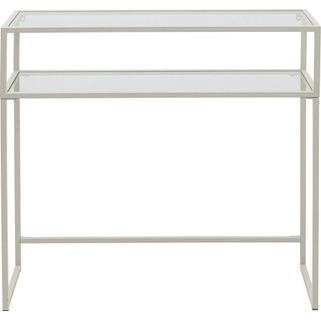 Konsola z półką LOFT GREIGE - szarobeżowy Wymiary: - szerokość: 85 cm - głębokość: 30 cm - wysokość: 80 cm Materiał: - blat: szkło hartowane -...