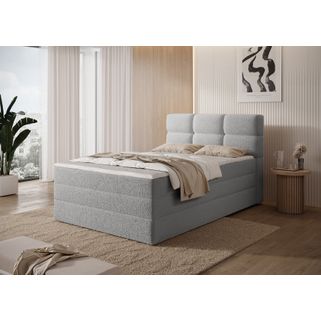 Łóżko kontynentalne Kasped to nowoczesny i funkcjonalny wybór do każdej sypialni, dostępny w dwóch rozmiarach: 215x121x108 cm oraz 215x141x108 cm, co...