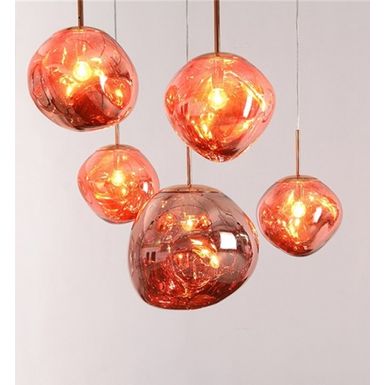 Lampa wisząca FUSION 40 - miedziany   Lampa Fusion 40 kształtem przypomina roztopioną szklaną kulę. Podobny efekt można zaobserwować przy produkcji...