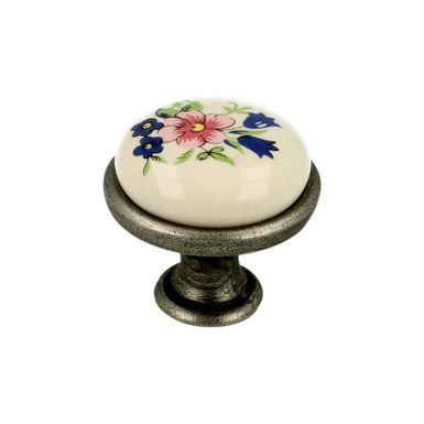 Gałka GP19 - nikiel patynowany, porcelana mleczna z kwiatem / fi 29 mm   Wymiary: - średnica: 29 mm - wysokość: 24 mm   Materiał: - metal (ZnAl) -...