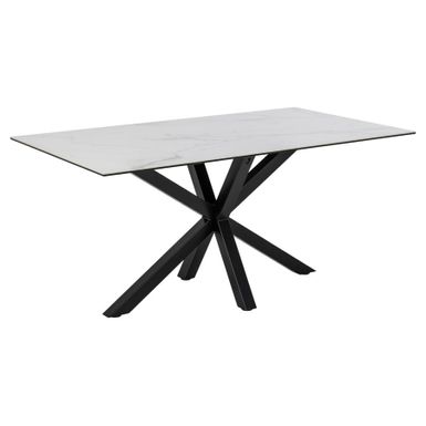 Stylowy stół HEAVEN składa się z białego prostokątnego blatu wykonanego z ceramicznego materiału, który dodaje meblowi elegancji i klasy. Biały kolor...