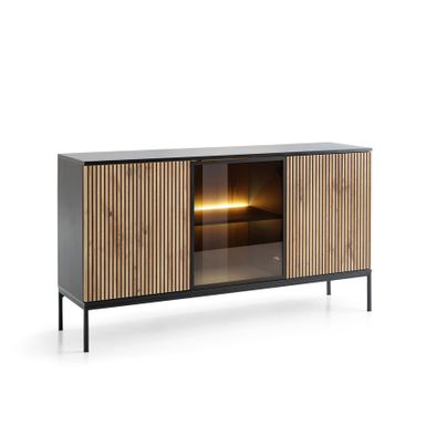 Komoda 3-drzwiowa z oświetleniem Tierra to połączenie nowoczesnego designu z funkcjonalnością, które doda charakteru każdemu wnętrzu. Jej stylistyka...