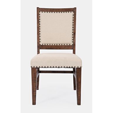 Krzesło tapicerowane w stylu rustykalnym w kolorze ciemnego drewna z charakterystycznymi przetarciami shabby-chic. Prostą formę o surowym wykończeniu...