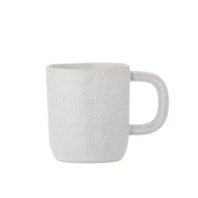 Kubek z uchwytem ADDISON 250 ml - biały    Kubek Addison firmy Bloomingville jest wykonany z kamionki z eleganckim, biało nakrapianym szkliwem. Ten kubek...