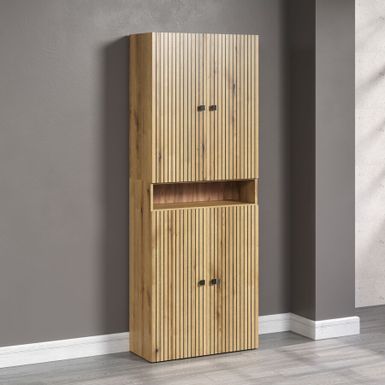 Wymiary: - szerokość: 70 cm - głębokość: 31 cm - wysokość: 186 cm   Materiał:  - korpus: laminat dąb evoke - front: laminat dąb evoke, ryflowany z...