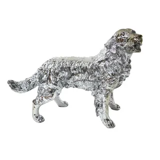 Designerska figurka doskonale odwzorowująca postać golden retrievera. Wykonana z niezwykłą starannością z żywicy, pokryta stylowym srebrnym lakierem....