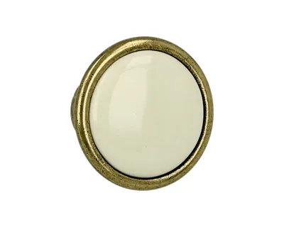 Gałka ROMANA 1700 - stary mosiądz, jasnobeżowa gładka porcelana / fi 29 mm