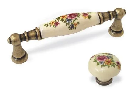 Gałka 24136 - stary mosiądz, kremowa ceramika z kwiatem / fi 30 mm